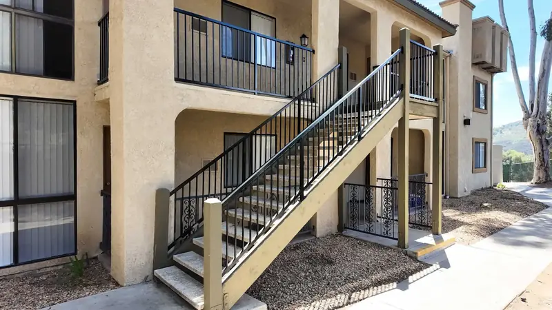 Multi-family balcony guardrails and exterior elevated walkway rails