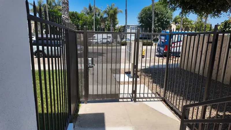 Walk-through custom pedestrian security entry gate with digital keypad lock in San Diego